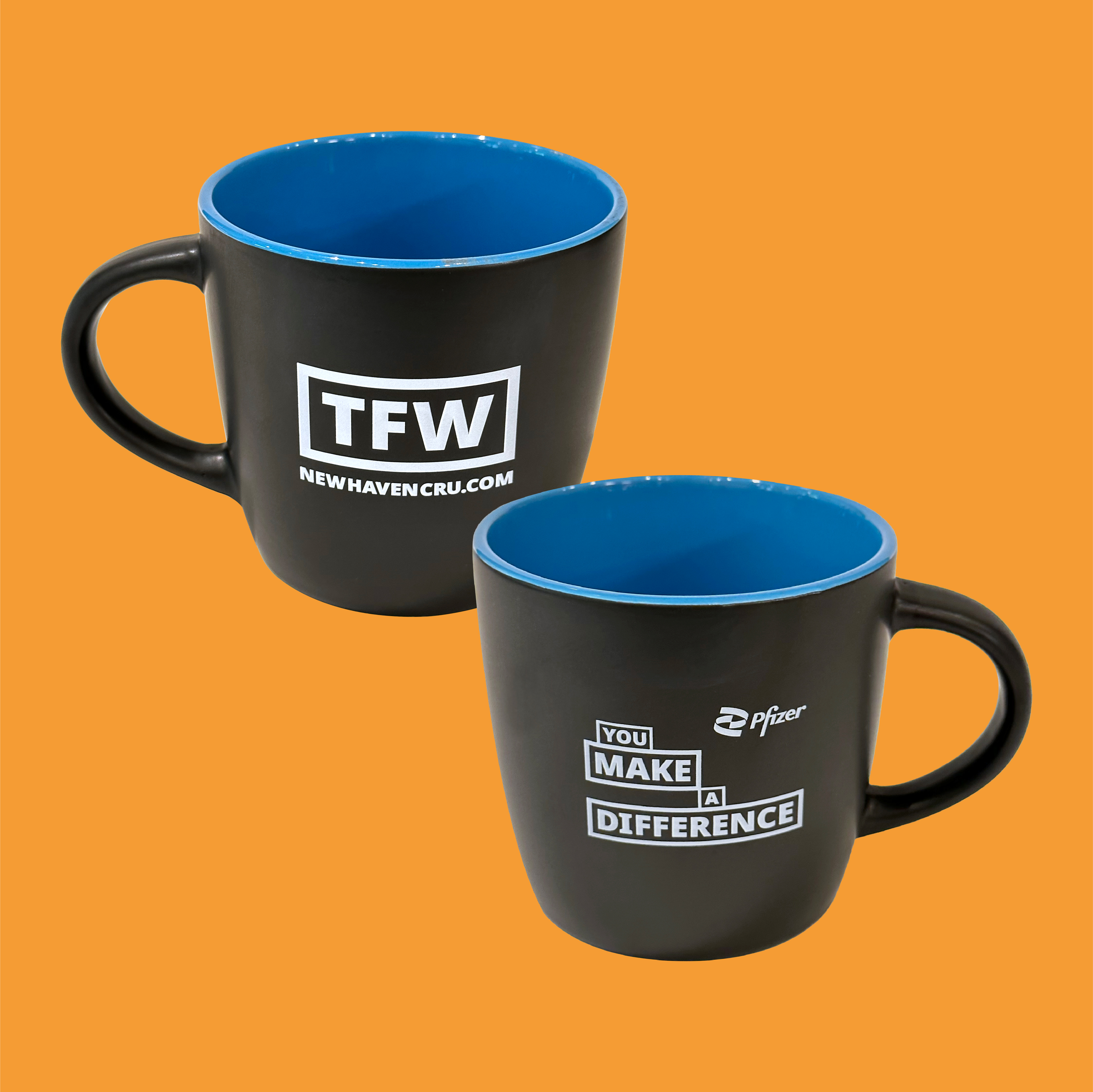 The front and back of a black coffee mug with a blue interior against a bright orange background. White print on the mug says "you make a difference", “TFW”, and “NewHavenCRU.com” with a Pfizer logo.