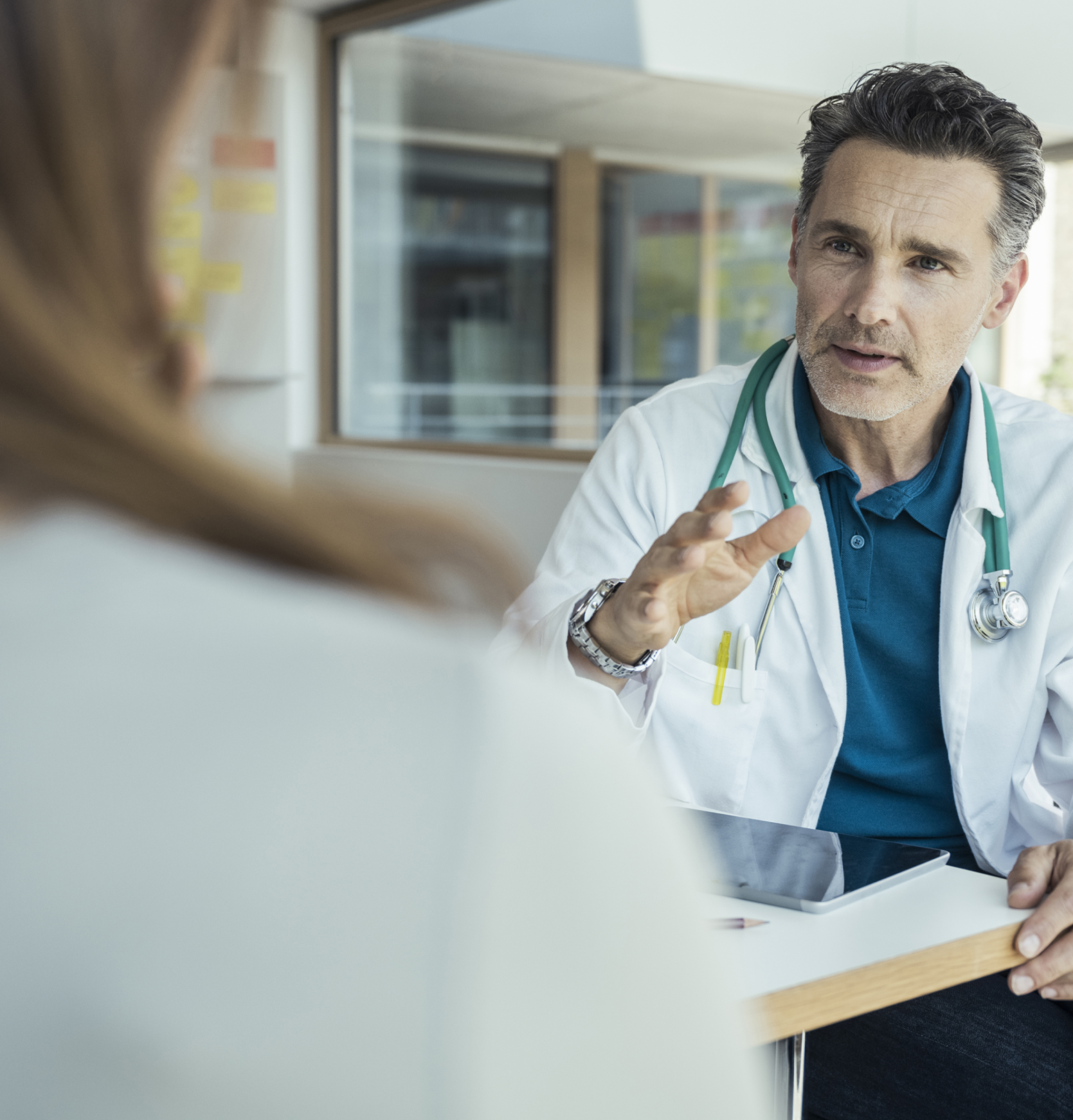 Patient and doctor in clinic