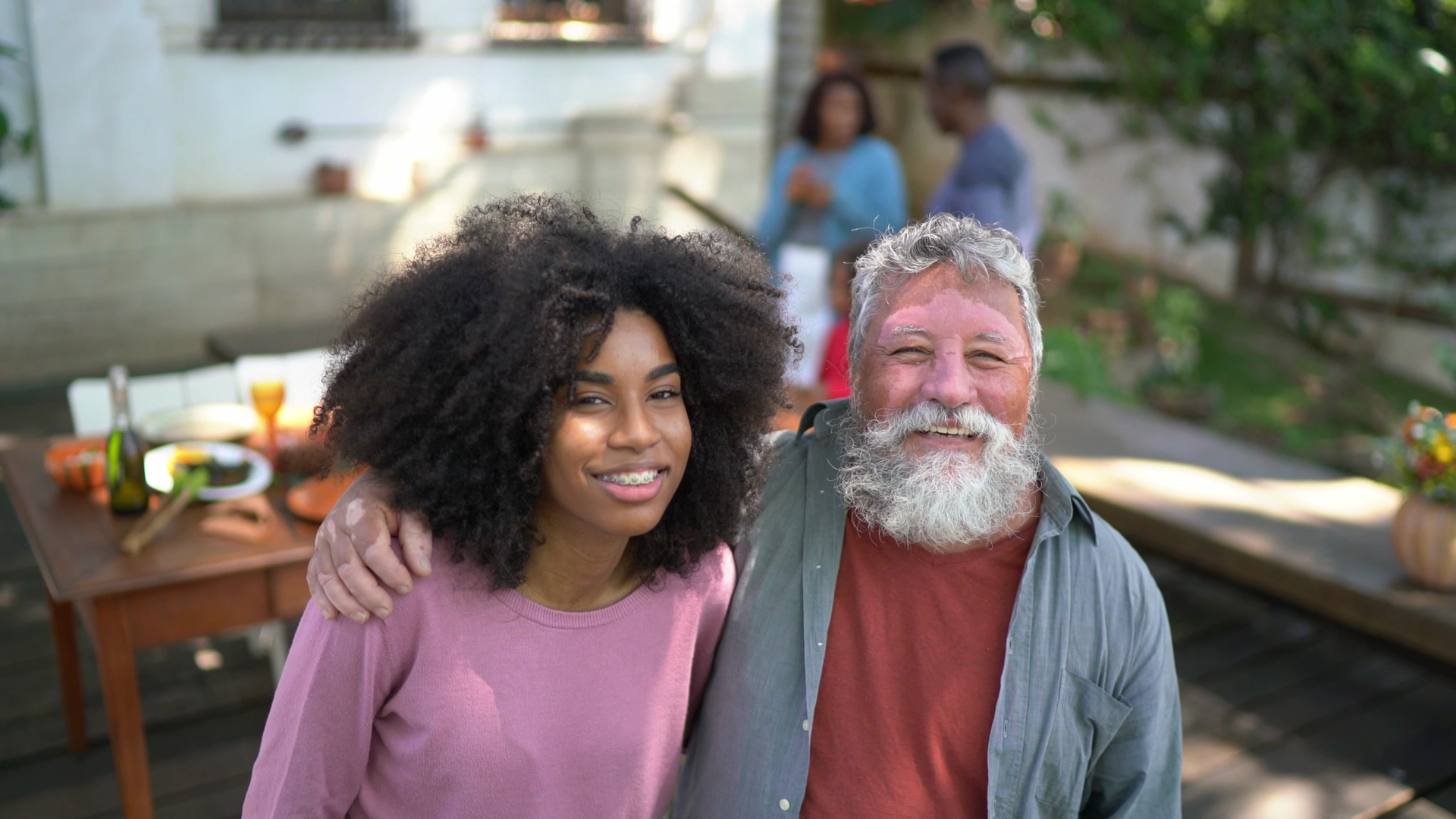 Portrait of father and daughter at home