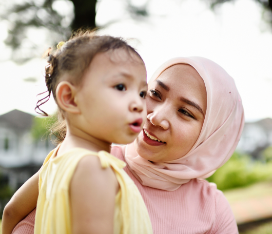 Pediatric clinical trial participant and mother together