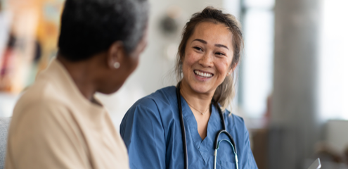 Clinical trial volunteer having screening discussion with healthcare provider