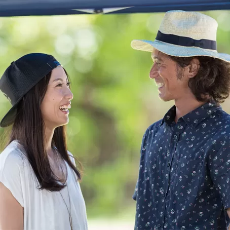 Couple having fun under gazebo – Pfizer Clinical Trials