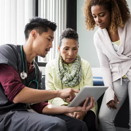 Clinical trial participant discussing with health care provider