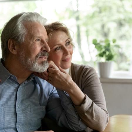 Elderly couple looking into the distance – Pfizer Clinical Trials