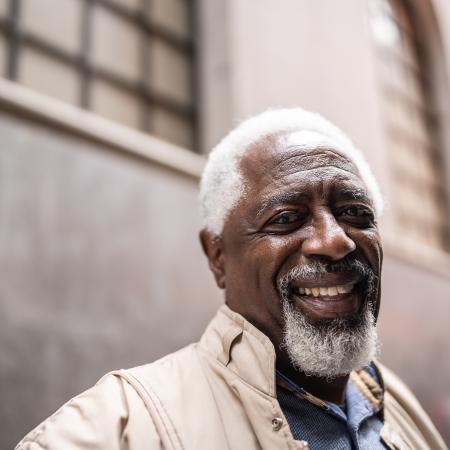 Mature man on street – Pfizer Clinical Trials